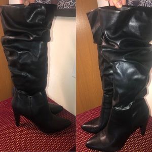 Black pointed toe boots